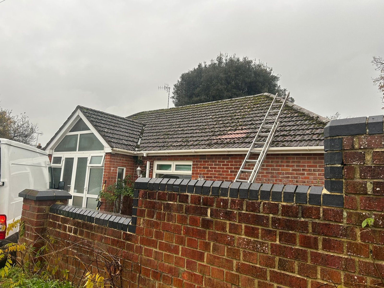Before and after roof cleaning on Waterlooville property